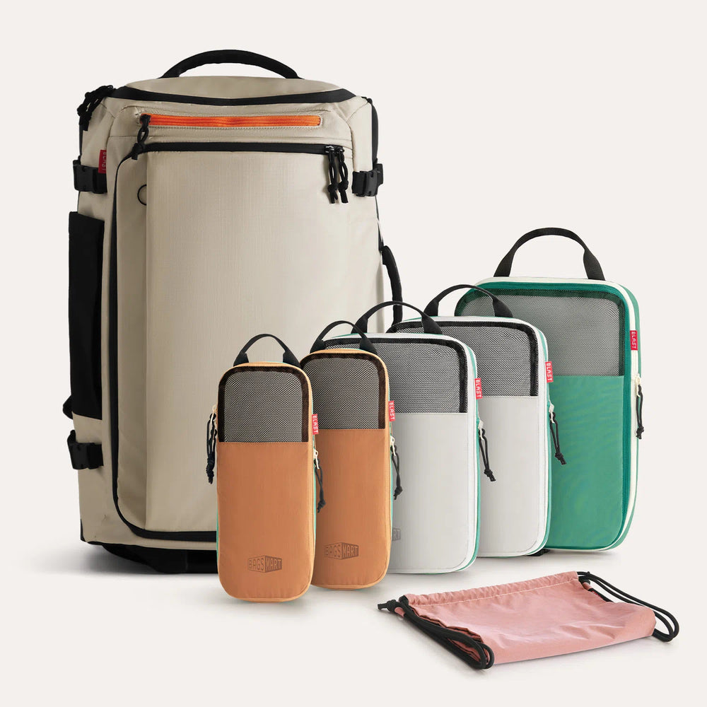 Set of travel packing cubes and a large beige backpack with multiple compartments, orange zipper, and black accents for luggage organization - SKU: BM0301148AN022BM01040486N222