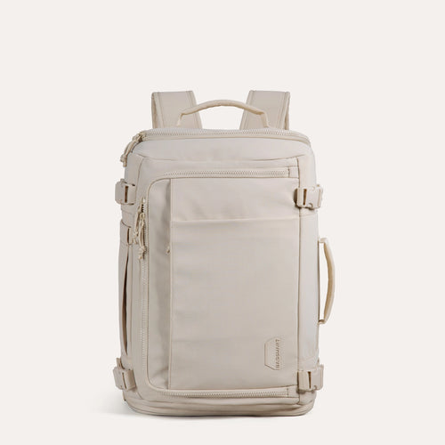 Cream-colored travel backpack with ventilated mesh back, adjustable chest strap, water-resistant fabric, and multiple compartments for travel essentials - SKU: BM0301094AC022